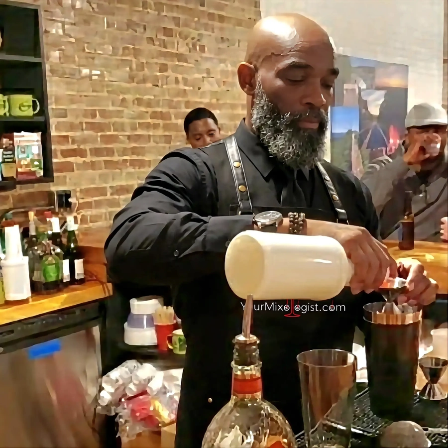 Carlus Houston, Founder and CEO of Majestic Maraschinos, pouring a cocktail